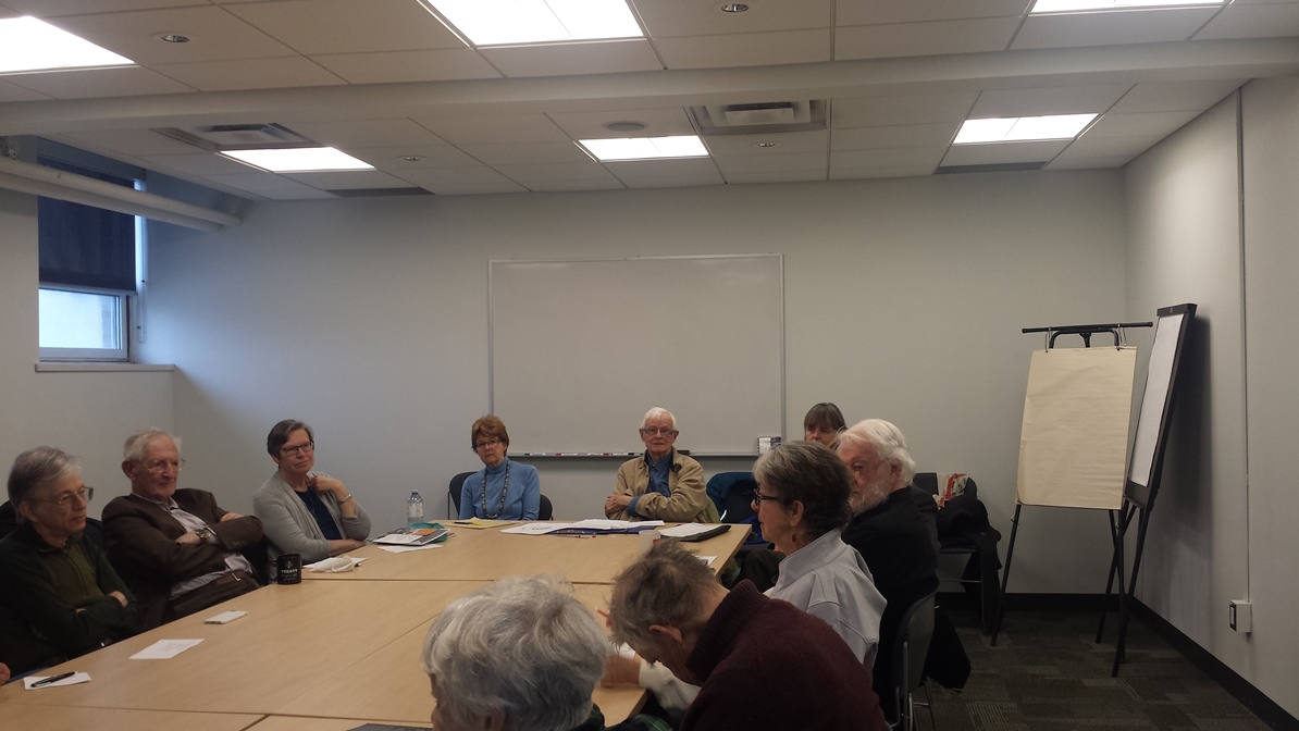 Link to one of the colloquia meetings with an image of people in the Senior College committee room.